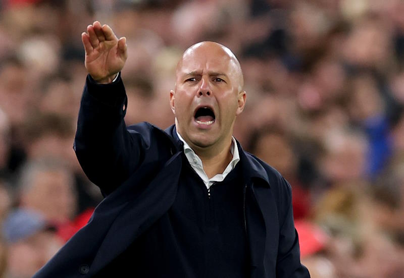 Liverpool boss Arne Slot gestures during a game
