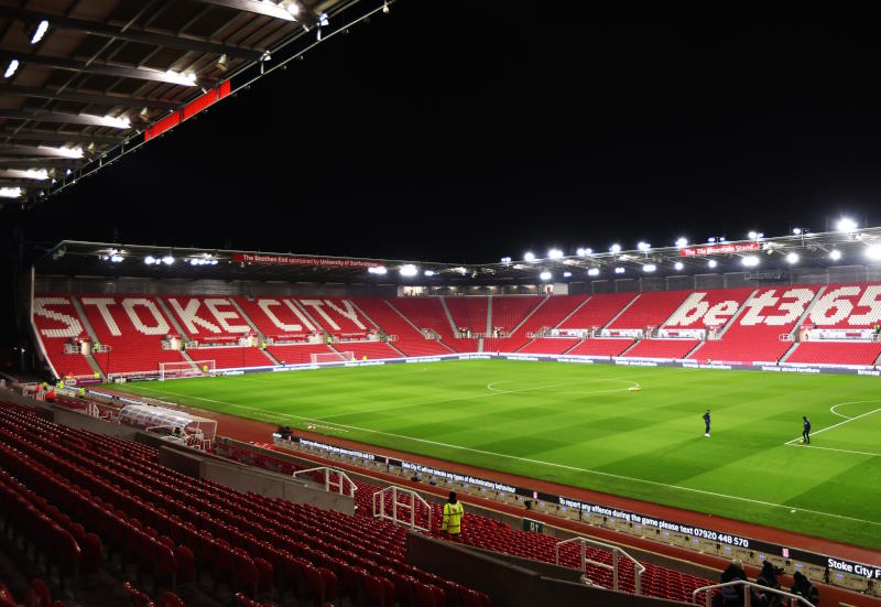 Stoke City's stadium seen inside, empty and under the floodlights