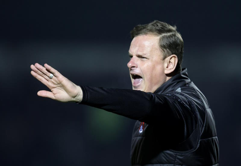 Leyton Orient manager Richie Wellens gestures to his players