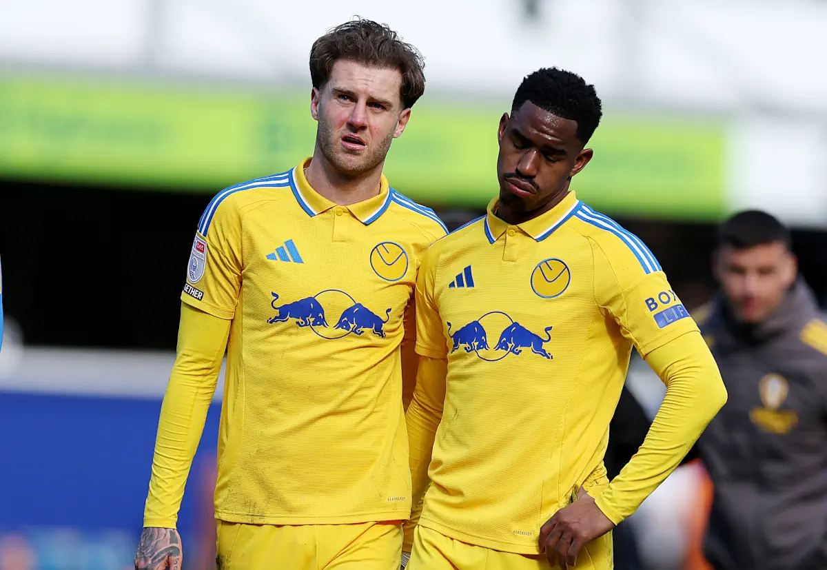 Leeds pair Joe Rodon and Junior Firpo look dejected