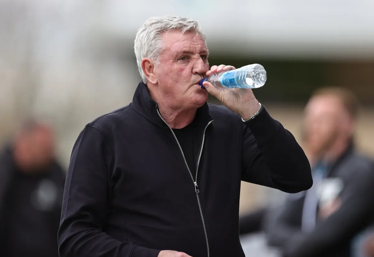 Blackpool boss Steve Bruce drinks from a water bottle